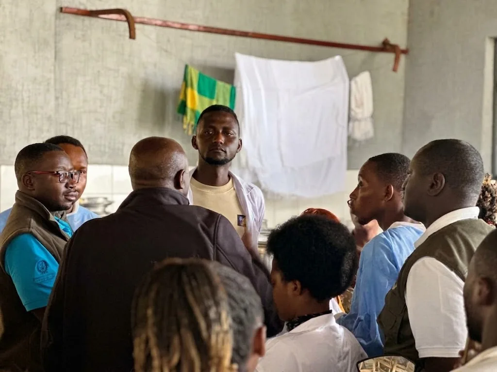 Team members in discussion at the farm